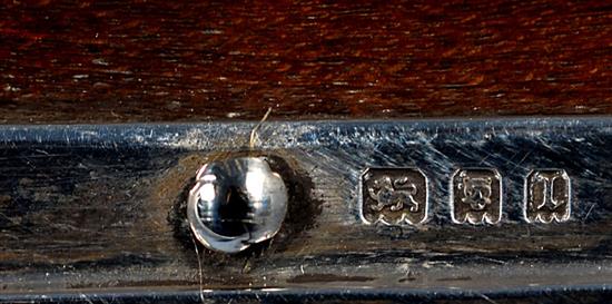 A rare George V shaped silver mounted sycamore? small mazer/salt, by Omar Ramsden, height 49mm.